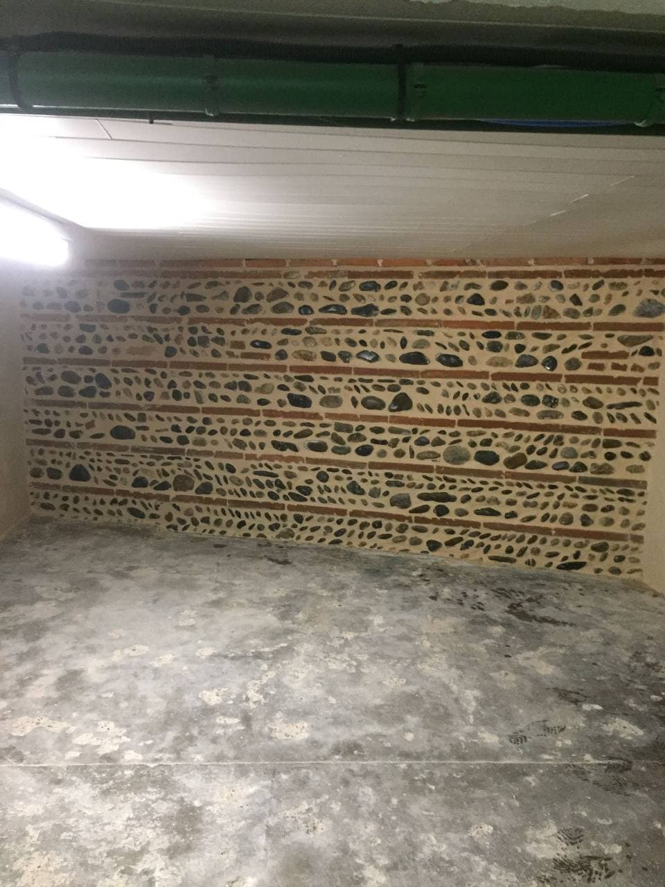 Restauration d’un mur ancien en galets & aménagement extérieur